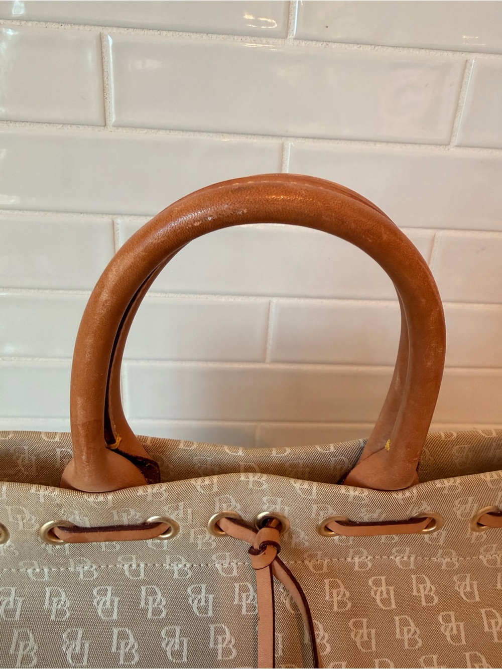 Dooney & Bourke tassel tote with brown leather handles - Picture 6 of 12